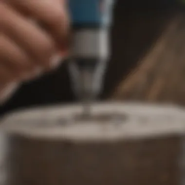 Dremel Tool with Diamond Sanding Drum Dremel tool in action with diamond sanding drum attached, focused on detail work