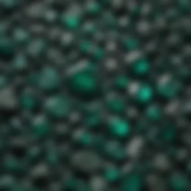 A collection of various dark green gemstones displayed elegantly.