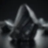 Close-up of a stunning black tourmaline crystal showcasing its natural facets