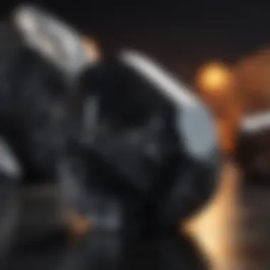 A striking polished obsidian stone reflecting light with a glossy surface