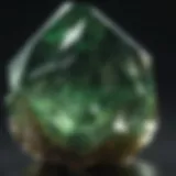 Close-up view of a polished green crystal reflecting light