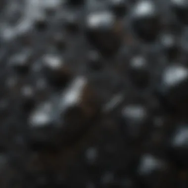Detailed Texture of Glittery Black Sparkly Rock Close-up of a glittery black sparkly rock showcasing its unique surface texture