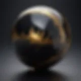 Close-up of gold sheen obsidian sphere showcasing its reflective surface