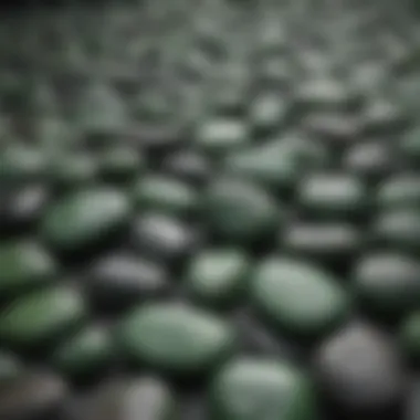 Various types of green stones with black lines displayed together