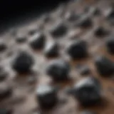 A close-up view of raw black diamonds embedded in rock