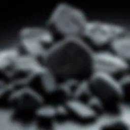 A collection of various black healing stones showcasing their unique textures and shapes.